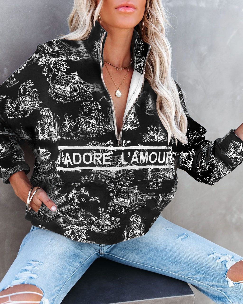 Sudadera estampada con media cremallera y cuello alto