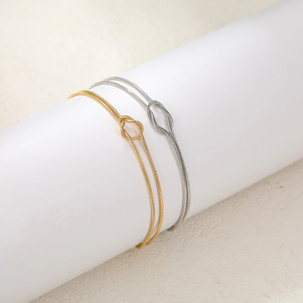 Pulseras para Parejas de Nudos en Oro y Plata