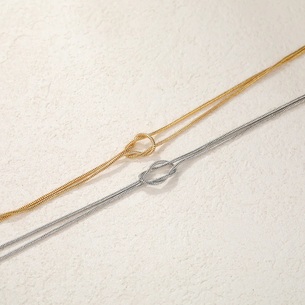 Pulseras para Parejas de Nudos en Oro y Plata