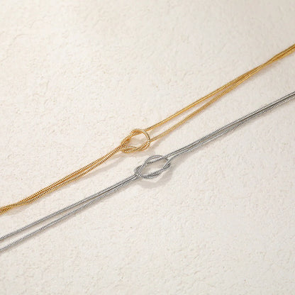 Pulseras para Parejas de Nudos en Oro y Plata