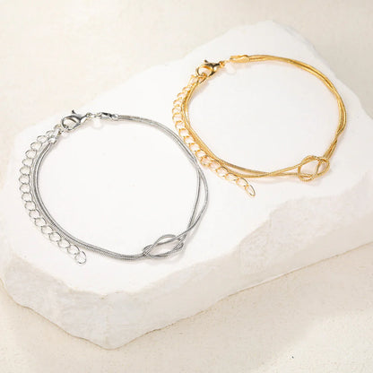 Pulseras para Parejas de Nudos en Oro y Plata