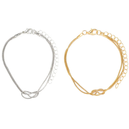 Pulseras para Parejas de Nudos en Oro y Plata