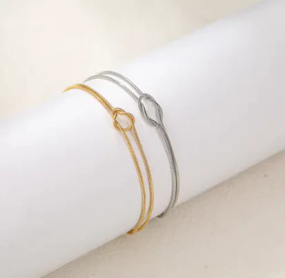 Pulseras para Parejas de Nudos en Oro y Plata